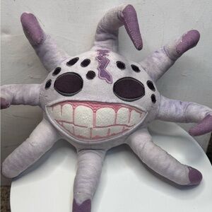 Purple and White Plush Toy